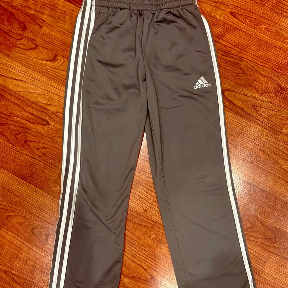 Adidas Kids gray sweats with Adidas signature white stripes. Kids size Small.